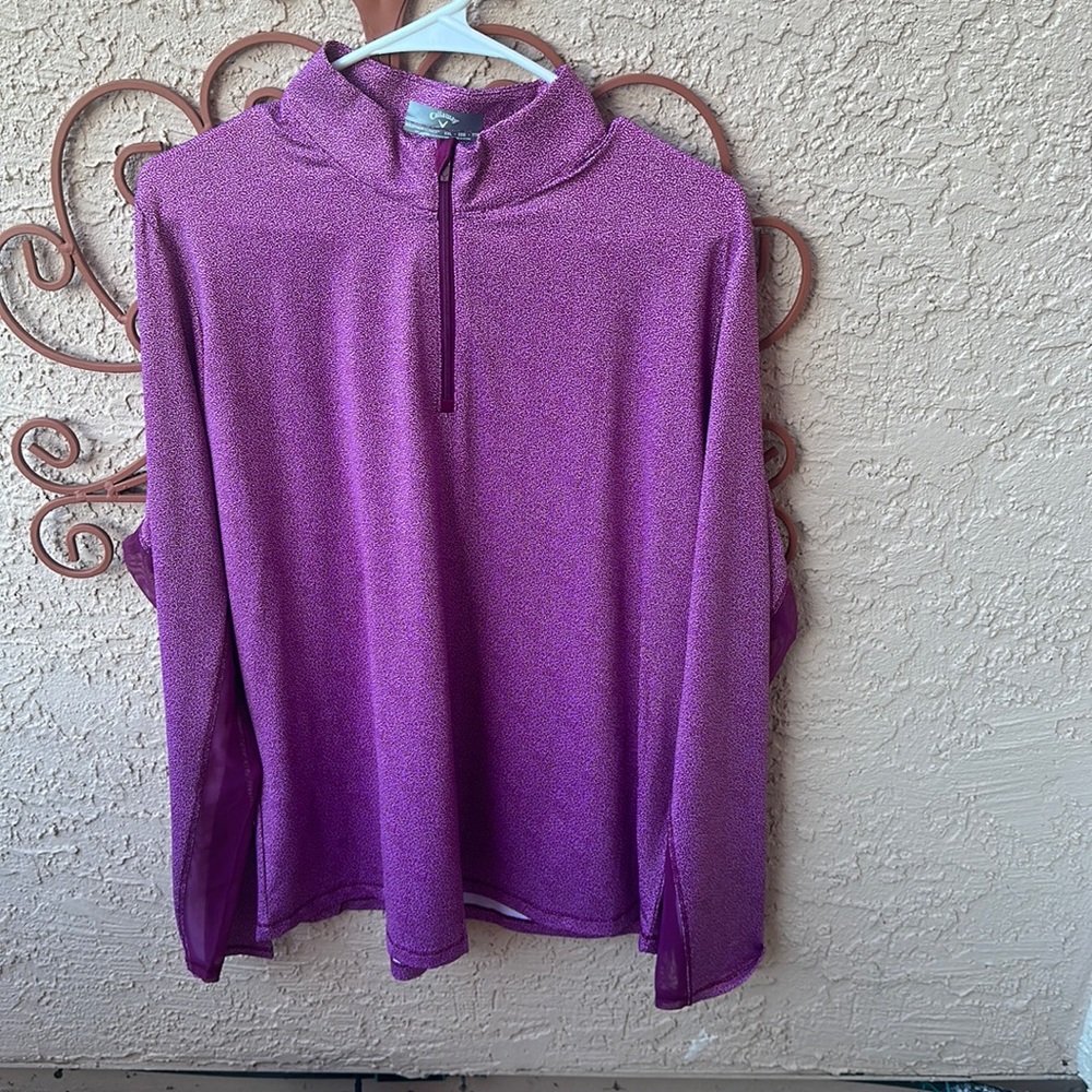 Callaway women’s golf pullover with partially mesh sleeves.Never worn.